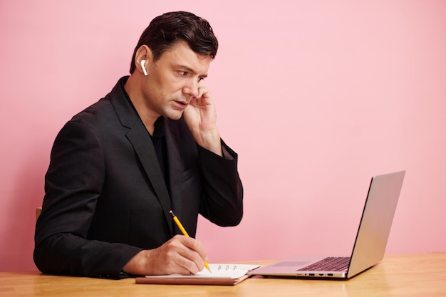 Man Calling Coworker to Discuss Report