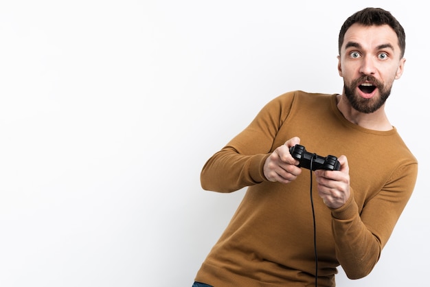 Photo man captivated by video game