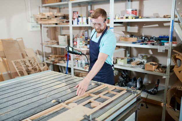 Man in carpentry shop