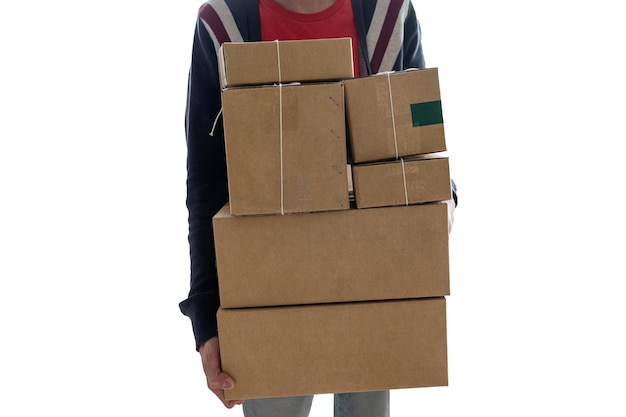 Man carrying stacked cardboard boxes or parcel box