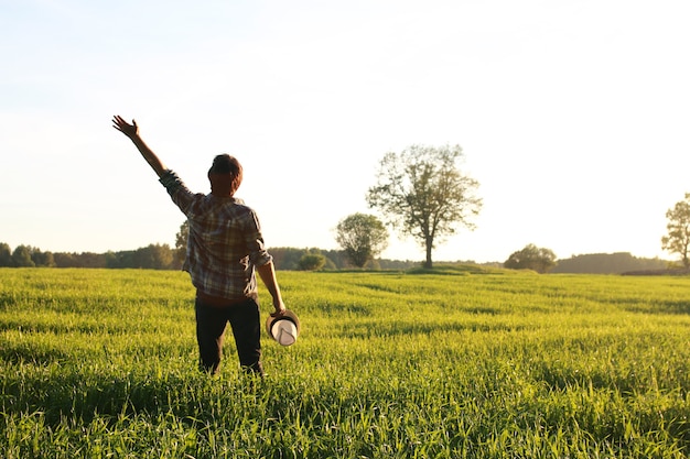 A man in casual clothes is a traveler in the open spaces