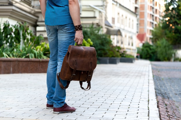 Man in casual clothes with backpack