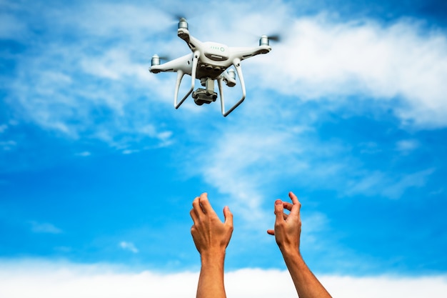 Man catching a drone