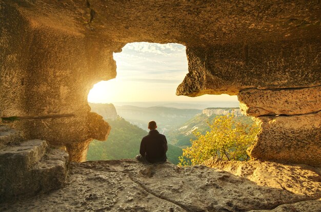 Man in cave mountain