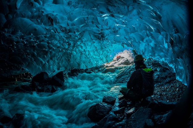 Man in cave during winter