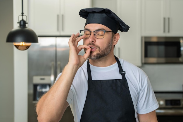 Man chef cooker baker male chefs with sign of perfect food chef cooking showing sign for delicious c