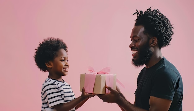 A man and a child are standing in front of a red wall