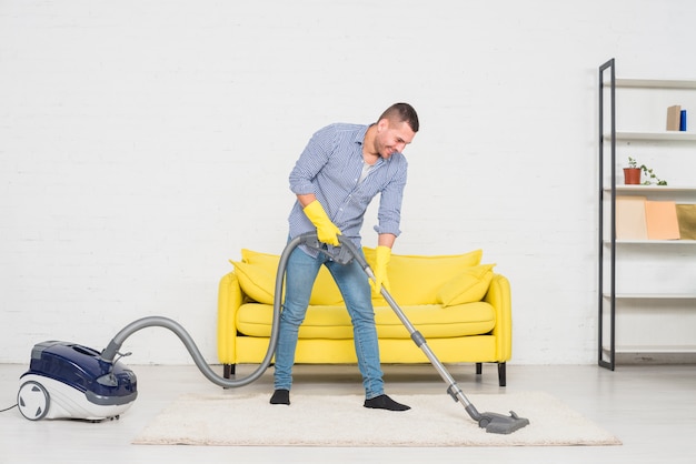 Man cleaning his home