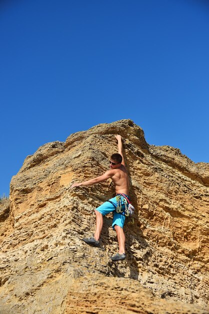 Man climbing on Mountain