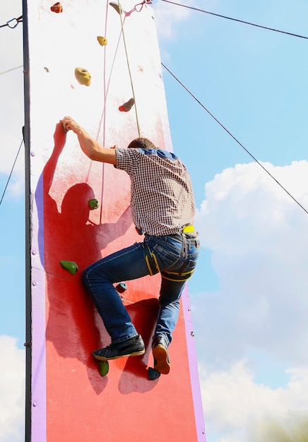 A man climbing a rock wall