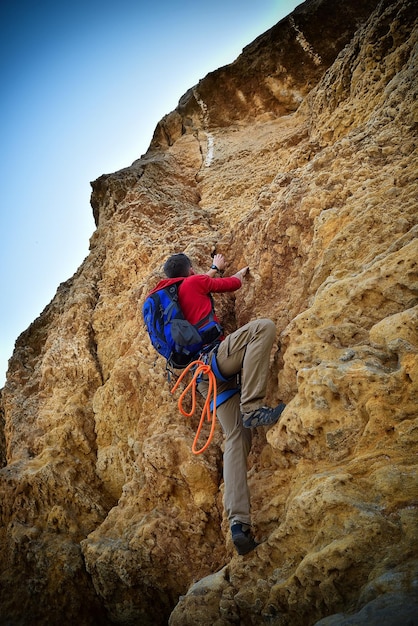 Man climbing on rock