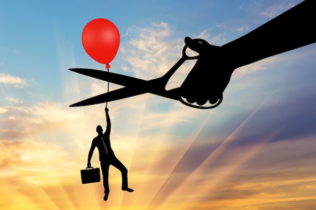 A man climbs up holding onto a balloon, and a hand with scissors intends to cut it off. The concept of a rival