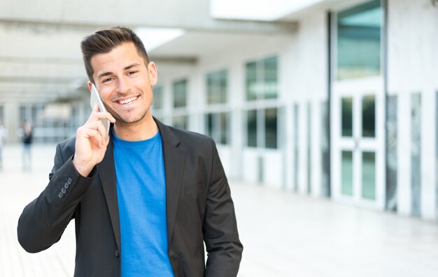 Man close up with a mobile phone