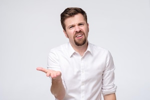 Man complaining or grumbling with hands forward trying to explain his point of view