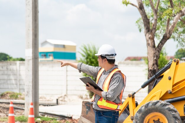 Man construction engineer at construction site