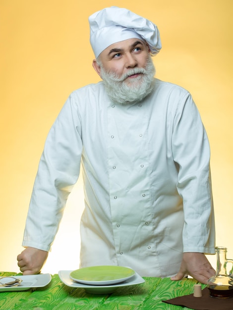 Man cook with dishes