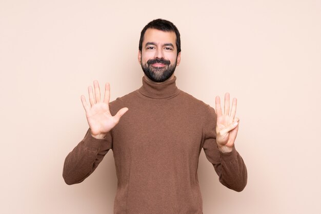 Man counting eight with fingers