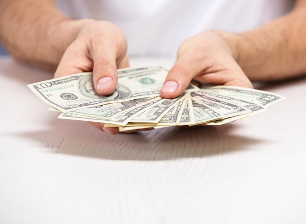 Man counting money and calculations