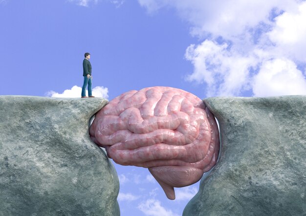 Man crossing cliff with brain