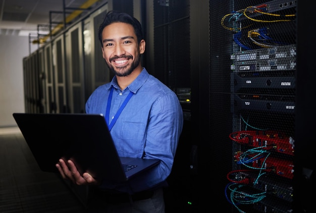 man data center and computer in programming portrait server room coding and programming or cybersecurity business person on laptop and engineering network gdpr software and backup or maintenance