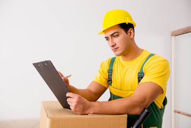 Man delivering boxes during house move