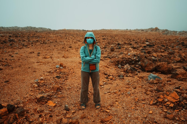 man in a desert area like Mars