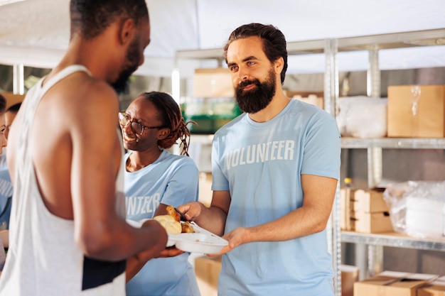 Photo man distributes food to less privileged