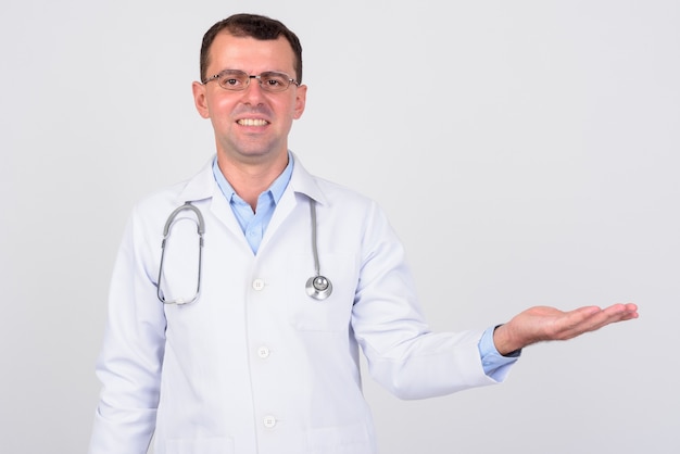 man doctor wearing eyeglasses on white