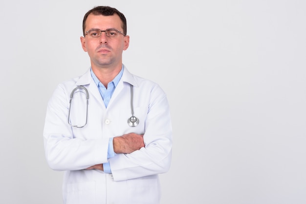 man doctor wearing eyeglasses on white