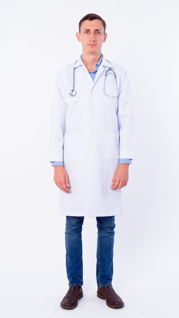  man doctor with stethoscope around neck isolated against white wall