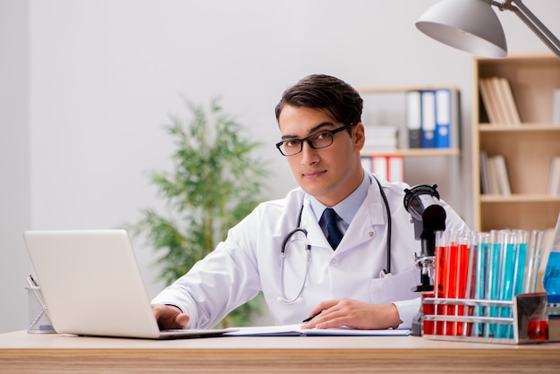 Man doctor working in the lab