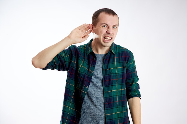 Man does not hear well, makes gestures with his hands