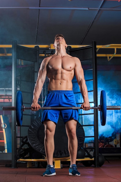 Man doing exercises with barbell