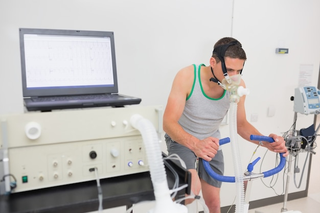 Man doing fitness test on exercise bike