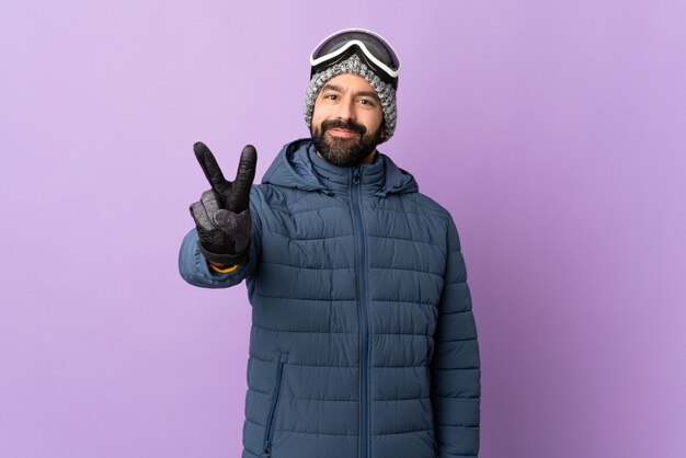 Man doing snowboard over isolated wall