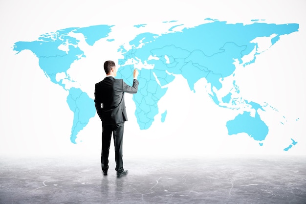 man drawing map