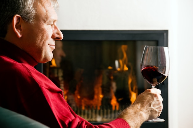 Man drinking red wine