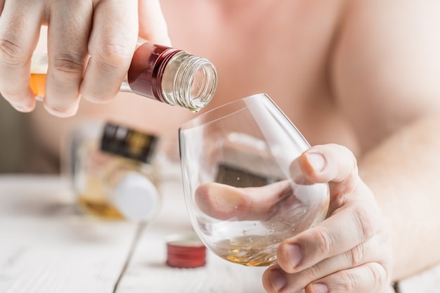 A man drinks alcohol during quarantine