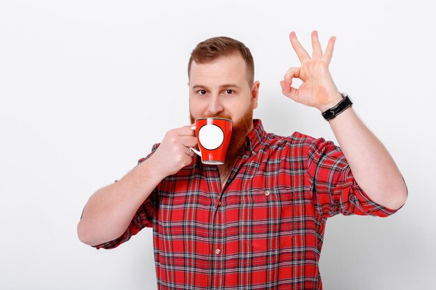 Man drinks coffee to wake up