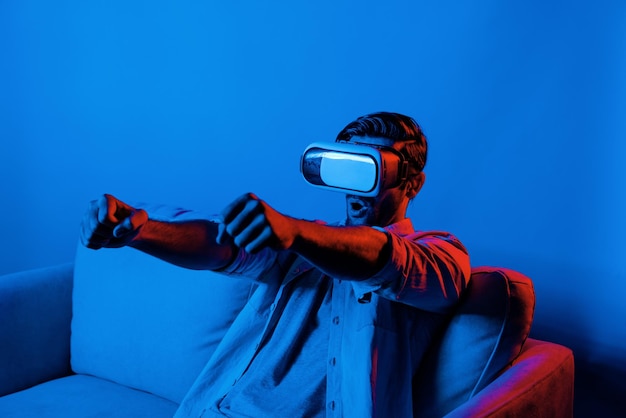Photo man drive a car movement while wear vr glasses and sitting at sofa deviation