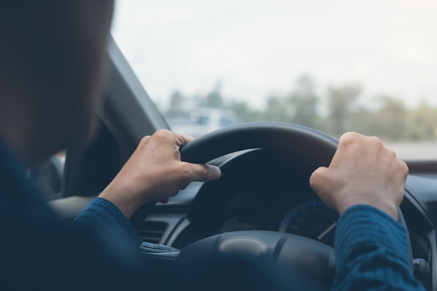 Man driving a car