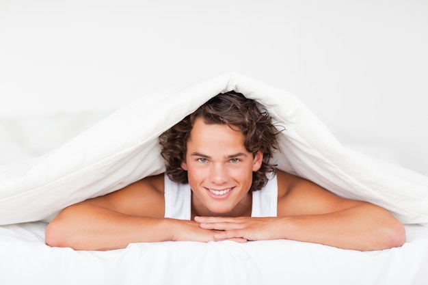 Man under a duvet