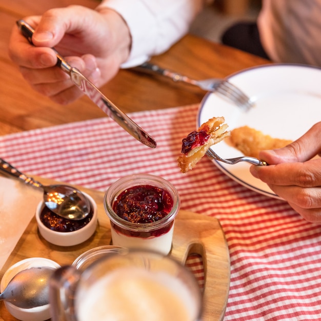 Man eating jam sweet desserts