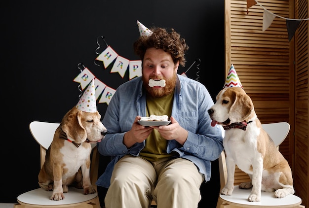 Man eating treats for animal