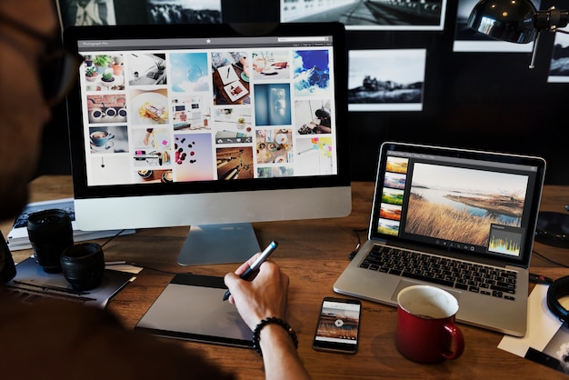 Man editing photos on a computer