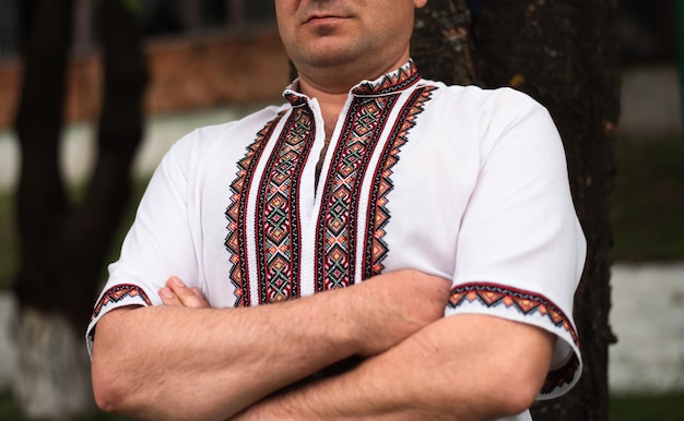 man in a embroidered shirt