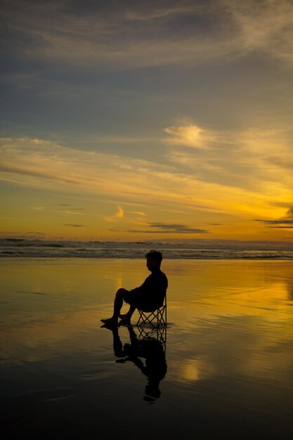 a man enjoying the clear afternoon sky