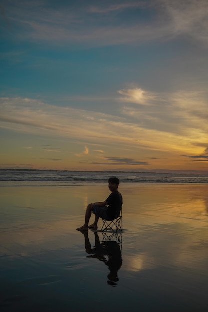 a man enjoying the clear afternoon sky