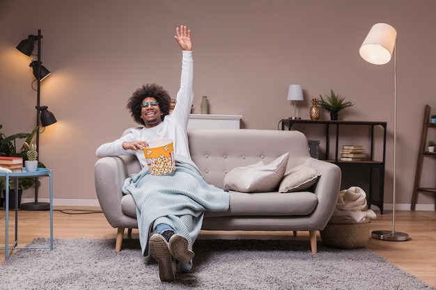 Man enjoying movie and popcorn