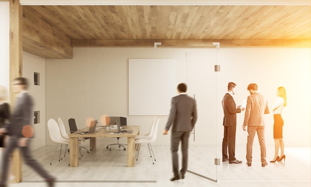 Man entering room with brainstorming colleagues